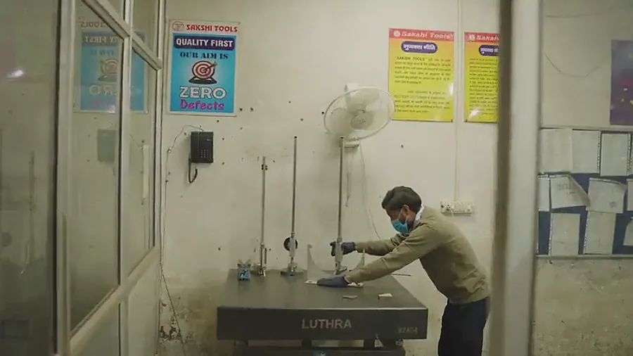Dimensional inspection on a granite surface plate in the Sakshi Tools inspection room